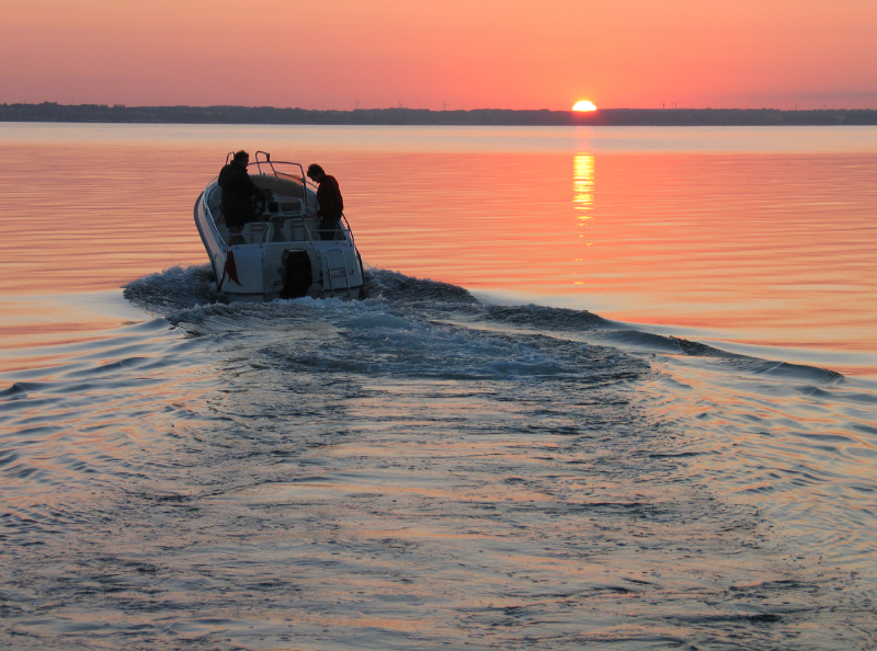 speedboat in sunset at Lake Norman
